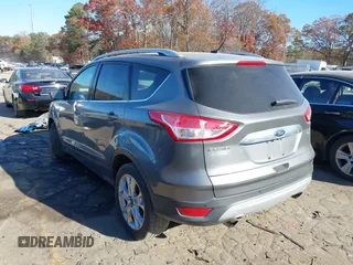 2014 Ford Escape Titanium with VIN 1FMCU9J94EUC50534, listed as a IAAI auction lot 41040341 with 115,502 mi miles. Bid and sale history available at carsss.com. Image 3.