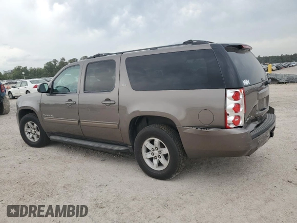 2013 GMC Yukon XL SLT with VIN 1GKS1KE01DR305054, listed as a Copart auction lot 54831015 with 158,054 mi miles and Salvage Title. Bid and sale history available at DreamBid. Image 2.