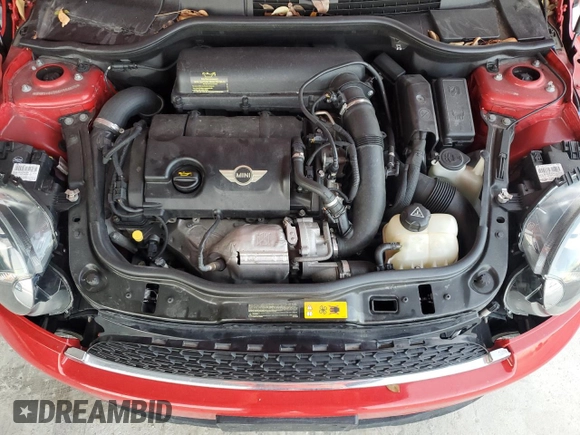 2013 MINI Roadster S z VIN WMWSY3C56DT593875, wystawiony jako Copart lot #74982124 z przebiegiem 64 622 mil mil oraz Szkody całkowita. Historia ofert i sprzedaży dostępna na DreamBid. Obrazek 13.