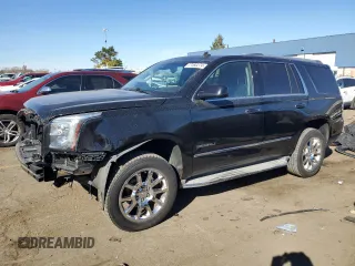 2015 GMC Yukon Denali with VIN 1GKS1CKJ9FR134446, listed as a Copart auction lot 77460274 with 158,903 mi miles and Clean Title. Bid and sale history available at carsss.com. Image 1.
