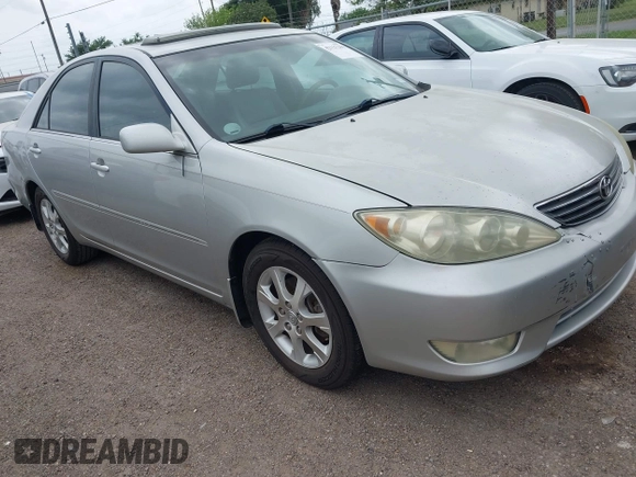 2006 Toyota Camry LE z VIN 4T1BF32K86U119208, wystawiony jako IAAI lot #42127284 z przebiegiem 99 864 mil mil oraz . Historia ofert i sprzedaży dostępna na DreamBid. Obrazek 1.