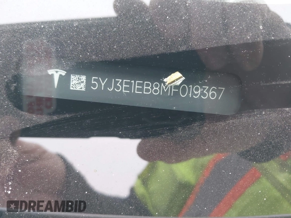 2021 Tesla Model 3 Long Range with VIN 5YJ3E1EB8MF019367, listed as a IAAI auction lot 41506094 with 14,257 mi miles and . Bid and sale history available at DreamBid. Image 9.
