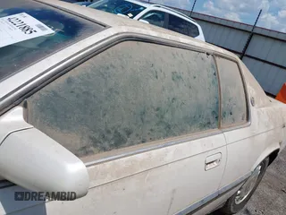 1994 Cadillac Eldorado ESC z VIN 1G6EL12Y4RU604343, wystawiony jako IAAI lot #42221885 z przebiegiem Nie podano mil oraz . Historia ofert i sprzedaży dostępna na DreamBid. Obrazek 6.
