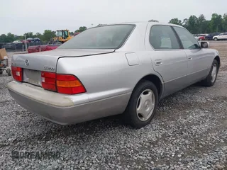 1999 Lexus LS 400 z VIN JT8BH28F1X0162721, wystawiony jako IAAI lot #42379655 z przebiegiem 316 746 mil mil oraz . Historia ofert i sprzedaży dostępna na DreamBid. Obrazek 4.