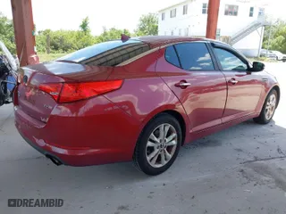 2011 Kia Optima EX with VIN KNAGN4A75B5185281, listed as a IAAI auction lot 41955141 with 191,102 mi miles. Bid and sale history available at carsss.com. Image 4.