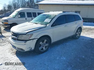 2016 Dodge Journey SE with VIN 3C4PDCAB6GT186547, listed as a IAAI auction lot 41263862 with 200,748 mi miles. Bid and sale history available at carsss.com. Image 2.