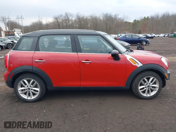 2013 MINI Cooper Countryman with VIN WMWZB3C57DWM07565, listed as a IAAI auction lot 41655938 with 62,694 mi miles. Bid and sale history available at carsss.com. Image 13.