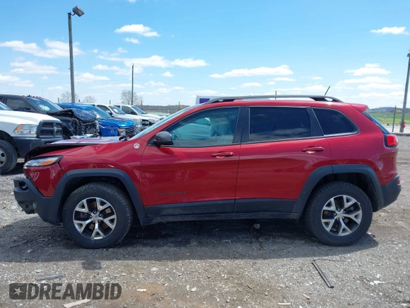 2015 Jeep Cherokee Trailhawk with VIN 1C4PJMBS0FW728361, listed as a IAAI auction lot 41978853 with 123,127 mi miles. Bid and sale history available at carsss.com. Image 14.