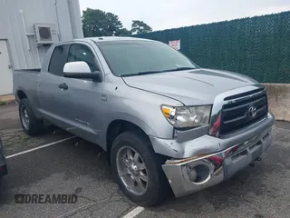 2010 Toyota Tundra with VIN 5TFUM5F12AX003655, listed as a IAAI auction lot 42656593 with 126,372 mi miles and . Bid and sale history available at DreamBid. Image 1.
