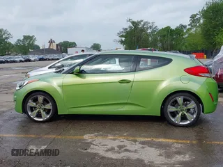 2012 Hyundai Veloster w/Gray Int with VIN KMHTC6AD6CU082432, listed as a IAAI auction lot 42121082 with 153,487 mi miles and . Bid and sale history available at DreamBid. Image 14.