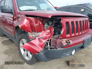 2016 Jeep Patriot Latitude with VIN 1C4NJPFB0GD582527, listed as a IAAI auction lot 41494076 with 166,263 mi miles and . Bid and sale history available at DreamBid. Image 6.