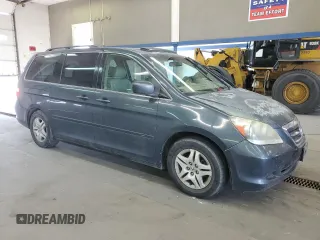 2005 Honda Odyssey EX-L z VIN 5FNRL38765B134604, wystawiony jako Copart lot #60455195 z przebiegiem 191 705 mil mil oraz Czysty tytuł • Clean title. Historia ofert i sprzedaży dostępna na DreamBid. Obrazek 4.