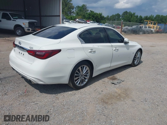 2018 Infiniti Q50 Luxe with VIN JN1EV7AP7JM352520, listed as a IAAI auction lot 42427317 with 73,717 mi miles and . Bid and sale history available at DreamBid. Image 4.