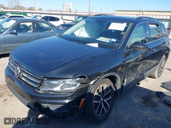 2021 Volkswagen Tiguan SE z VIN 3VV3B7AX4MM095811, wystawiony jako IAAI lot #41476490 z przebiegiem 25 668 mil mil oraz . Historia ofert i sprzedaży dostępna na DreamBid. Obrazek 16.