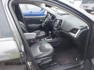 2014 Jeep Cherokee Limited with VIN 1C4PJLDS9EW301718, listed as a IAAI auction lot 41615778 with 114,022 mi miles and . Bid and sale history available at DreamBid. Image 5.