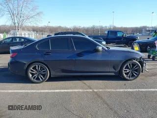 2020 BMW 3 Series M340i xDrive z VIN WBA5U9C08LFH41265, wystawiony jako IAAI lot #41572188 z przebiegiem 52 453 mil mil oraz . Historia ofert i sprzedaży dostępna na DreamBid. Obrazek 13.