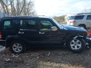 2012 Jeep Liberty Sport with VIN 1C4PJMAK0CW209498, listed as a IAAI auction lot 41881406 with 127,855 mi miles. Bid and sale history available at carsss.com. Image 12.