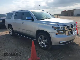 2020 Chevrolet Suburban Premier with VIN 1GNSCJKCXLR218158, listed as a IAAI auction lot 42032328 with 55,500 mi miles and . Bid and sale history available at DreamBid. Image 1.