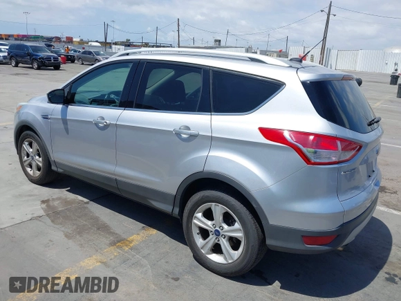 2016 Ford Escape SE with VIN 1FMCU0GX7GUB72822, listed as a IAAI auction lot 42136764 with 98,497 mi miles. Bid and sale history available at carsss.com. Image 3.