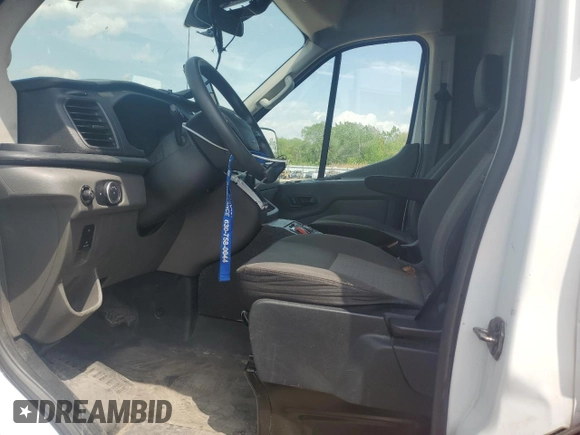 2021 Ford Transit z VIN 1FDBR1CG2MKA65340, wystawiony jako Copart lot #56920445 z przebiegiem Nie podano mil oraz Szkoda całkowita • Salvage title. Historia ofert i sprzedaży dostępna na DreamBid. Obrazek 7.