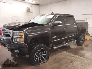 2015 Chevrolet Silverado 1500 High Country with VIN 3GCUKTEJXFG320011, listed as a IAAI auction lot 41366273 with 157,947 mi miles. Bid and sale history available at carsss.com. Image 18.