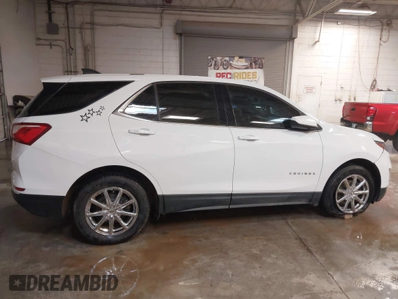 2019 Chevrolet Equinox LT z VIN 2GNAXUEV0K6182506, wystawiony jako IAAI lot #41377011 z przebiegiem 96 085 mil mil oraz . Historia ofert i sprzedaży dostępna na DreamBid. Obrazek 13.