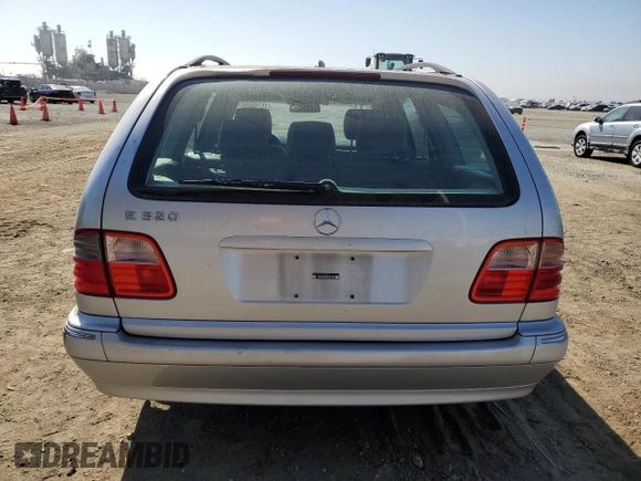 2001 Mercedes-Benz E-Class with VIN WDBJH65J01B276815, listed as a Copart auction lot 75748694 with 208,827 mi miles and Clean Title. Bid and sale history available at carsss.com. Image 6.