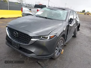 2023 Mazda CX-5 2.5 S Premium Package with VIN JM3KFBDM4P0174901, listed as a IAAI auction lot 41940271 with 25,805 mi miles. Bid and sale history available at carsss.com. Image 2.
