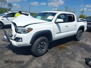 2020 Toyota Tacoma SR5 z VIN 5TFCZ5AN5LX231157, wystawiony jako IAAI lot #42045534 z przebiegiem 84 099 mil mil oraz . Historia ofert i sprzedaży dostępna na DreamBid. Obrazek 17.