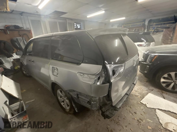 2015 Toyota Sienna L with VIN 5TDZK3DC5FS623224, listed as a Copart auction lot 54958485 with 82,419 mi miles and Salvage Title. Bid and sale history available at carsss.com. Image 3.