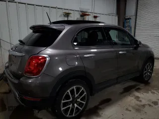 2016 FIAT 500X Trekking Plus с VIN ZFBCFYET6GP411632, выставлен на аукционе Copart как лот 43540735 с пробегом 87 608 миль миль и Списание • Salvage title. История ставок и продаж доступна на DreamBid. Изображение 3.