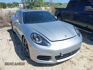 2014 Porsche Panamera S E-Hybrid with VIN WP0AD2A75EL044663, listed as a IAAI auction lot 41818381 with 44,194 mi miles and . Bid and sale history available at DreamBid. Image 1.