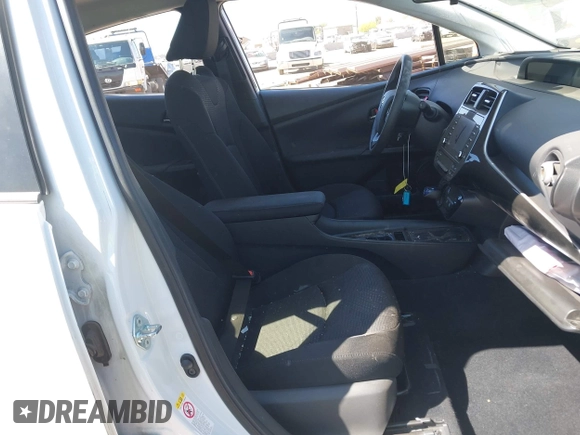 2022 Toyota Prius L Eco with VIN JTDKAMFUXN3181752, listed as a IAAI auction lot 42015717 with 129,637 mi miles and . Bid and sale history available at DreamBid. Image 5.