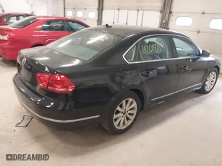 2013 Volkswagen Passat SEL Premium with VIN 1VWCP7A37DC068954, listed as a IAAI auction lot 42019750 with 127,943 mi miles. Bid and sale history available at carsss.com. Image 4.