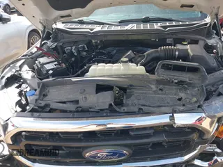 2023 Ford F-150 XL with VIN 1FTMF1C53PKF34184, listed as a IAAI auction lot 42242703 with 27,312 mi miles and . Bid and sale history available at DreamBid. Image 10.