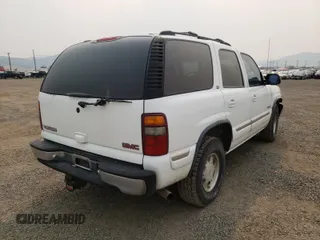 2001 GMC Yukon SLT z VIN 1GKEK13T61J150626, wystawiony jako Copart lot #49920601 z przebiegiem 224 707 mil mil oraz Czysty tytuł • Clean title. Historia ofert i sprzedaży dostępna na DreamBid. Obrazek 4.