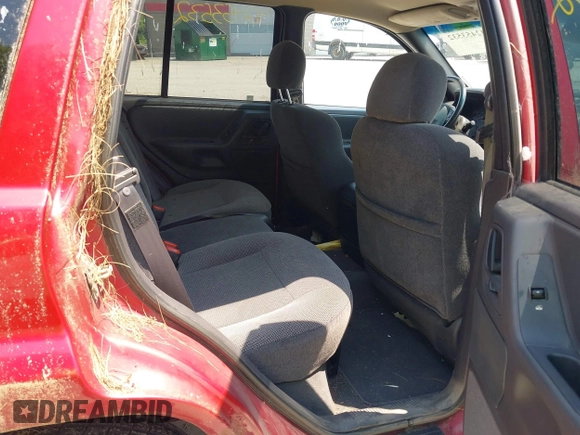 2001 Jeep Grand Cherokee Laredo z VIN 1J4GW48S11C720055, wystawiony jako IAAI lot #42453532 z przebiegiem 158 486 mil mil oraz . Historia ofert i sprzedaży dostępna na DreamBid. Obrazek 8.