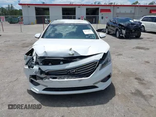 2016 Hyundai Sonata 2.4L z VIN 5NPE24AFXGH327870, wystawiony jako IAAI lot #42173050 z przebiegiem 72 000 mil mil oraz . Historia ofert i sprzedaży dostępna na DreamBid. Obrazek 12.