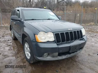 2008 Jeep Grand Cherokee Laredo with VIN 1J8GR48K38C141522, listed as a IAAI auction lot 41729365 with 201,096 mi miles. Bid and sale history available at carsss.com. Image 1.