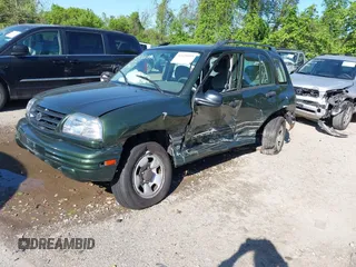 2001 Suzuki Vitara JX z VIN 2S3TD52V416109787, wystawiony jako IAAI lot #42126699 z przebiegiem Nie podano mil oraz . Historia ofert i sprzedaży dostępna na DreamBid. Obrazek 2.