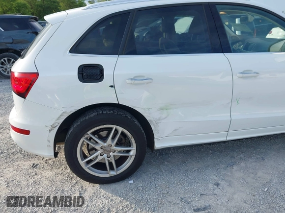 2015 Audi Q5 Premium Plus z VIN WA1DGAFPXFA054099, wystawiony jako IAAI lot #42192489 z przebiegiem 106 560 mil mil oraz . Historia ofert i sprzedaży dostępna na DreamBid. Obrazek 6.