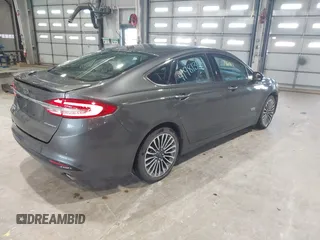 2017 Ford Fusion Titanium with VIN 3FA6P0SU2HR162865, listed as a IAAI auction lot 41981344 with 79,618 mi miles and . Bid and sale history available at DreamBid. Image 4.