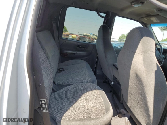 2001 Ford F-150 SuperCrew XLT with VIN 1FTRW08L31KF24186, listed as a Copart auction lot 65188904 with 0 mi miles and Salvage Title. Bid and sale history available at carsss.com. Image 10.