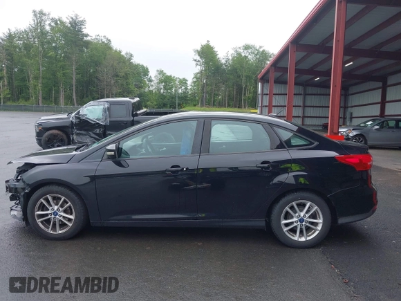 2017 Ford Focus SE with VIN 1FADP3F23HL293741, listed as a IAAI auction lot 42458992 with 85,686 mi miles and . Bid and sale history available at DreamBid. Image 15.