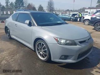 2011 Scion tC with VIN JTKJF5C77B3006901, listed as a IAAI auction lot 41805910 with 145,747 mi miles. Bid and sale history available at carsss.com. Image 1.