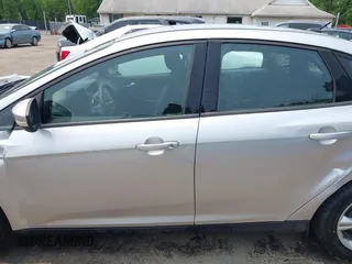 2013 Ford Focus SE with VIN 1FADP3F28DL208516, listed as a IAAI auction lot 42399006 with 103,869 mi miles and . Bid and sale history available at DreamBid. Image 14.