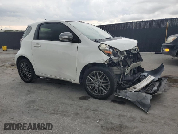 2013 Scion iQ with VIN JTNJJXB01DJ022687, listed as a Copart auction lot 61918195 with 117,483 mi miles and Salvage title. Bid and sale history available at DreamBid. Image 4.