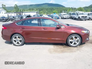 2015 Ford Fusion SE z VIN 3FA6P0T91FR202568, wystawiony jako IAAI lot #42596108 z przebiegiem 134 829 mil mil oraz . Historia ofert i sprzedaży dostępna na DreamBid. Obrazek 13.