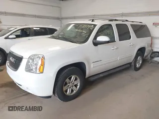 2013 GMC Yukon XL SLT with VIN 1GKS2KE70DR273126, listed as a IAAI auction lot 42147902 with 233,032 mi miles. Bid and sale history available at carsss.com. Image 2.