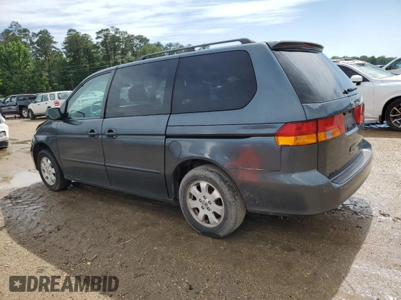 2003 Honda Odyssey EX-L with VIN 5FNRL18933B116127, listed as a Copart auction lot 56013645 with 157,118 mi miles and Salvage Title. Bid and sale history available at DreamBid. Image 2.